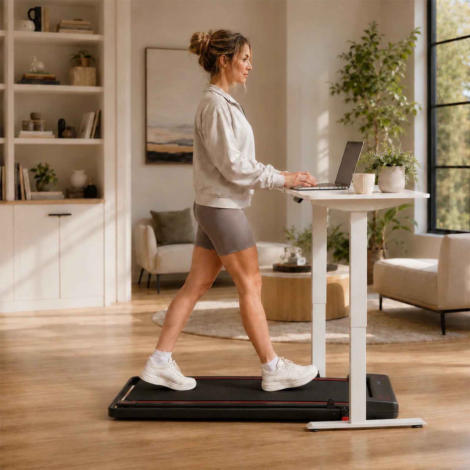 Woman using walking pad while working from home
